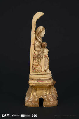 Santa Ana ensinando a Virgem a ler