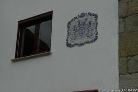 Detalhe da inscrição na parade da casa (casa do Leão)