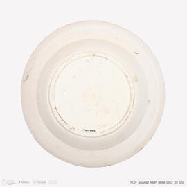 Prato com tocador de gaita de foles