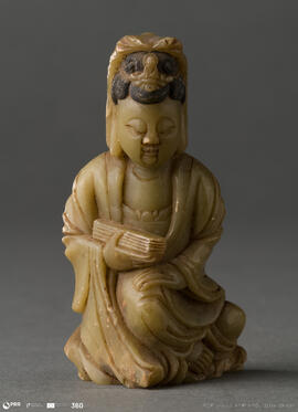 Figura masculina sentada