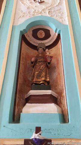 Nicho na parede com escultura