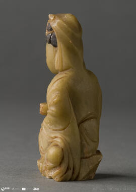 Figura masculina sentada