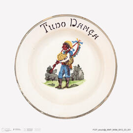 Prato com tocador de gaita de foles