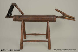 Burro de cardar e pentear